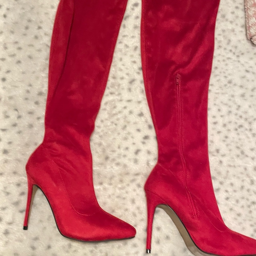 Red high heel over  the knee boots